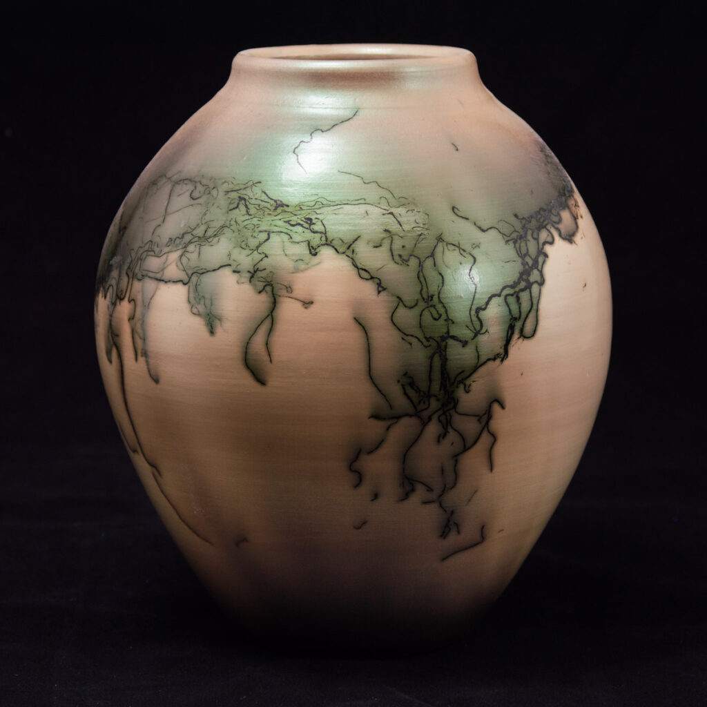 Horse hair raku technique will bring out the brilliant blush effect of the Interference series sigillatas.
